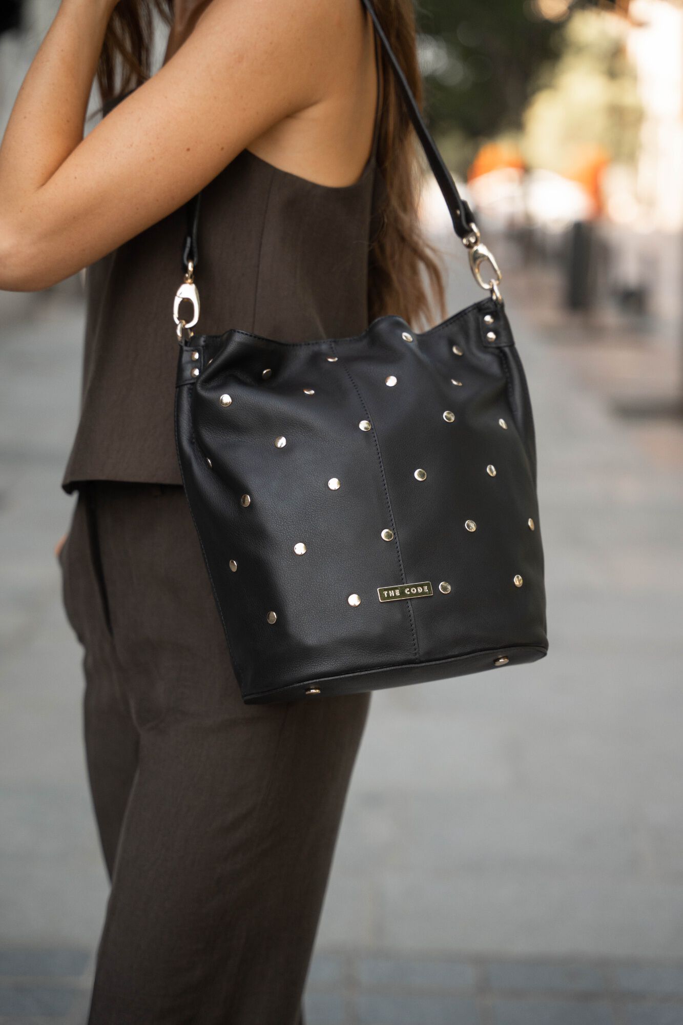 The Code Julieta leather and stud pouch bag Black