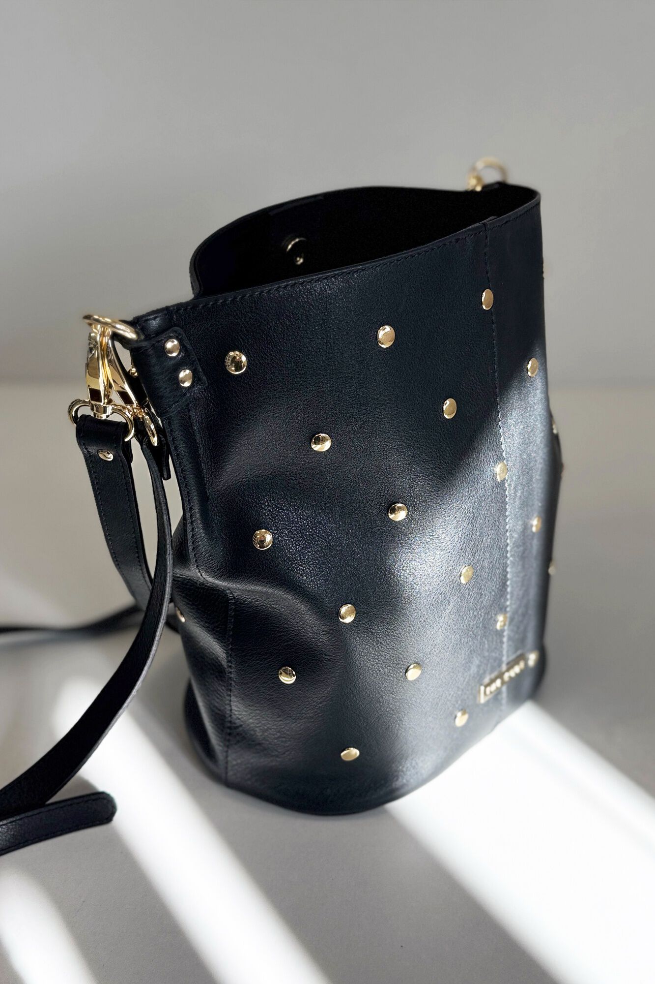 The Code Julieta leather and stud pouch bag Black