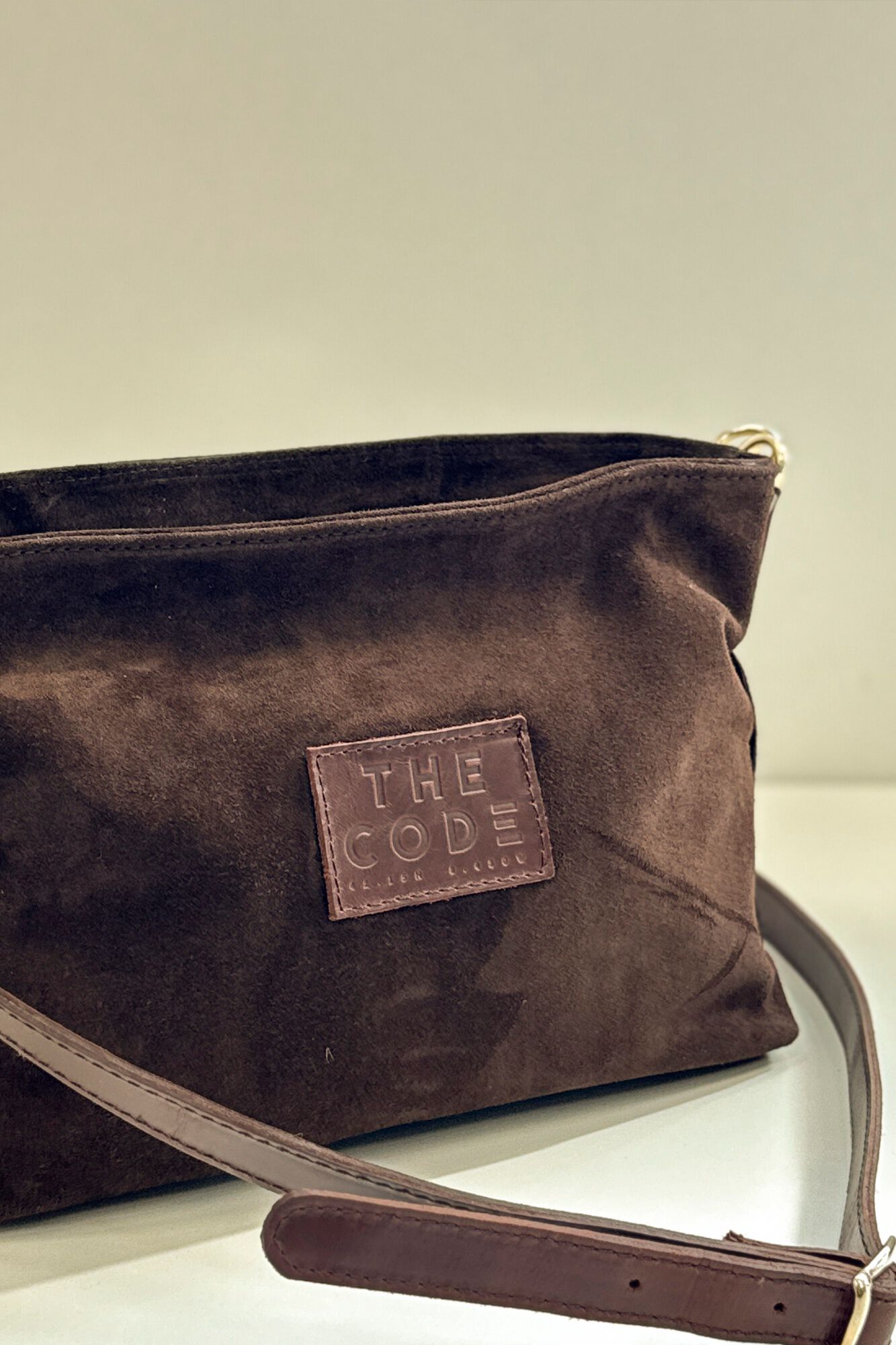 The Code Suede Dakota crossbody Dark brown