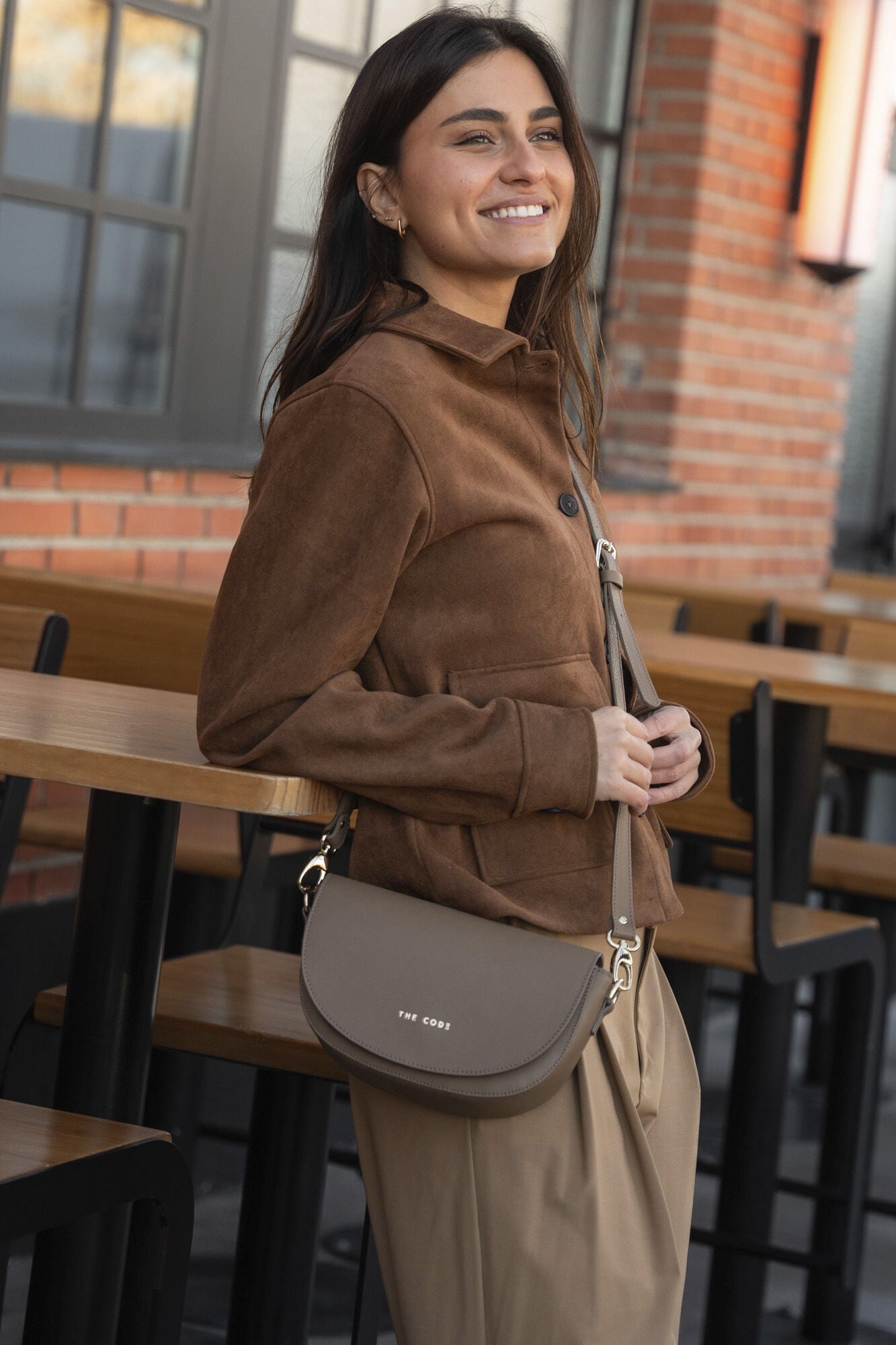 The Code Alma bag in taupe leather  Beige
