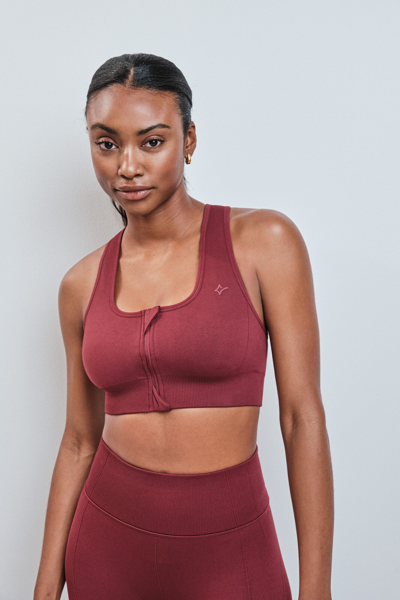 Dash and Stars Soutien desportivo vermelho com fecho-&eacute;clair SEAMLESS FIT